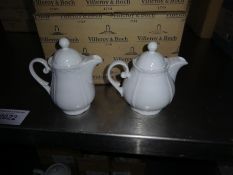 Eight Villeroy & Boch china teapots.