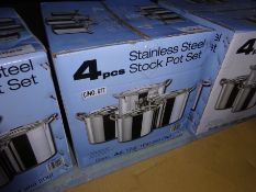 Four new stainless steel stock pot set.