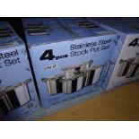 Four new stainless steel stock pot set.