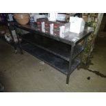 Stainless steel preparation table with two under shelfs.