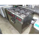 Moorwood Vulcan natural gas 6 burner oven on castors, width 60cms, depth 67cms and height 84cms.