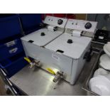 Infernus double table top fryer with front drain.