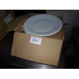 Twelve Villeroy & Boch round dinner plates.