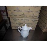 Eight Villeroy & Boch china teapots.