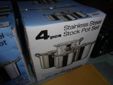 Four new stainless steel stock pot set.