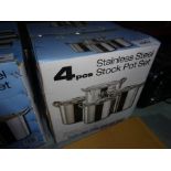 Four new stainless steel stock pot set.