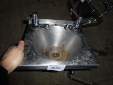 Hand washing sink with taps, width 30cms, depth 27cms.