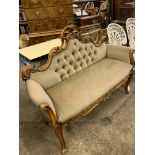 Pale green upholstered show wood button back two seat sofa