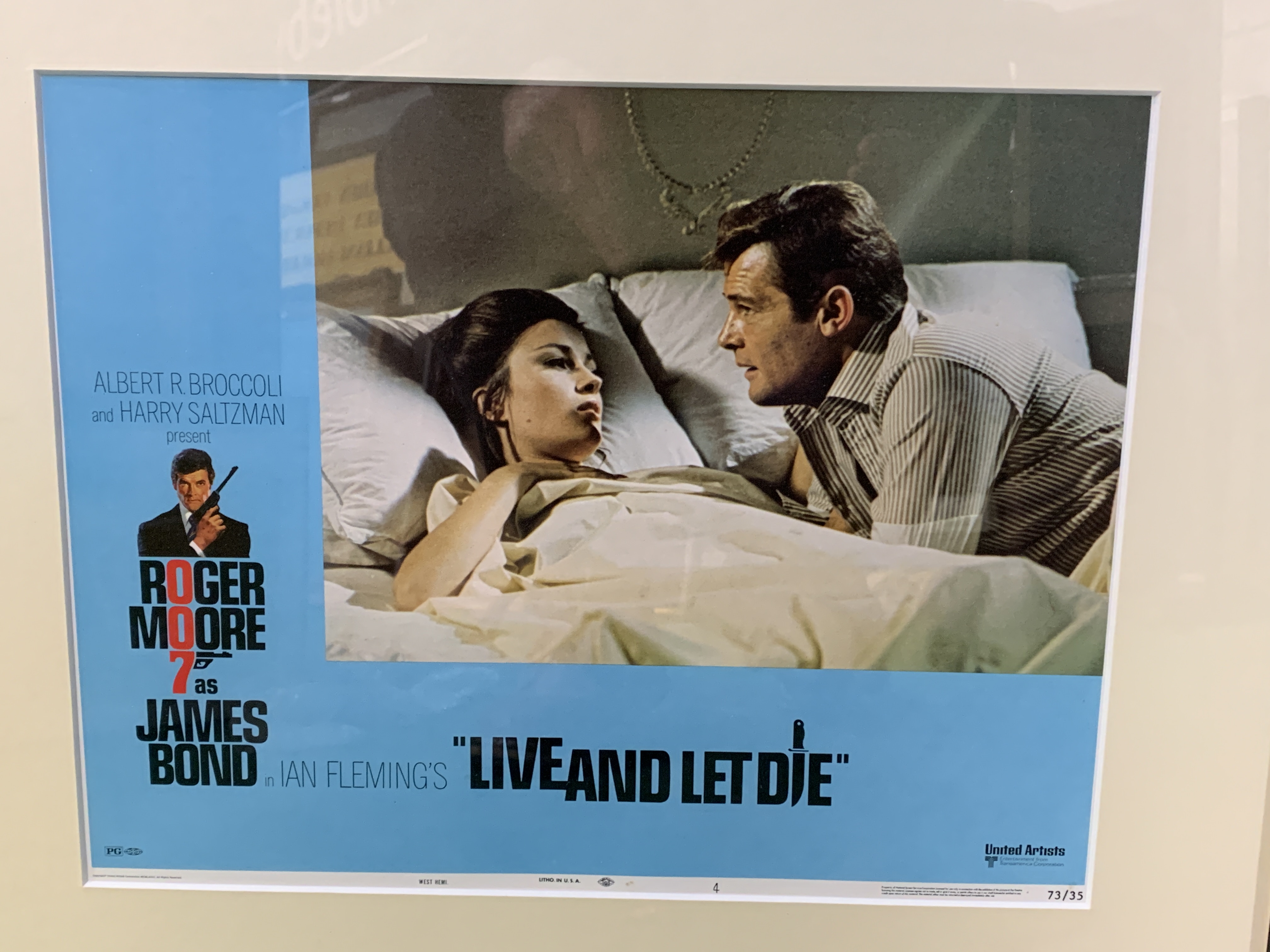 2 Framed and glazed prints of film posters: 'Live and Let Die' and 'The Spy Who Loved Me'