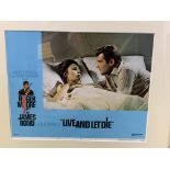 2 Framed and glazed prints of film posters: 'Live and Let Die' and 'The Spy Who Loved Me'