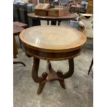 Mixed hardwood circular display table and a mahogany tilt top wine table