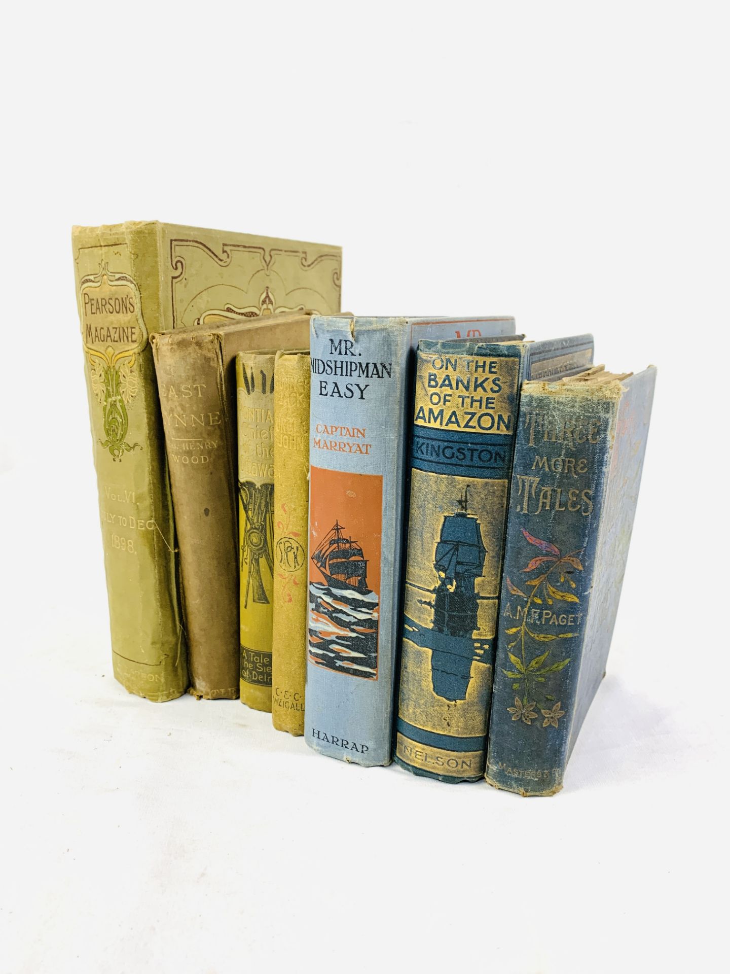 Seven early 20th century hard back novels, and a copy of Pearson's Magazine, 1898.