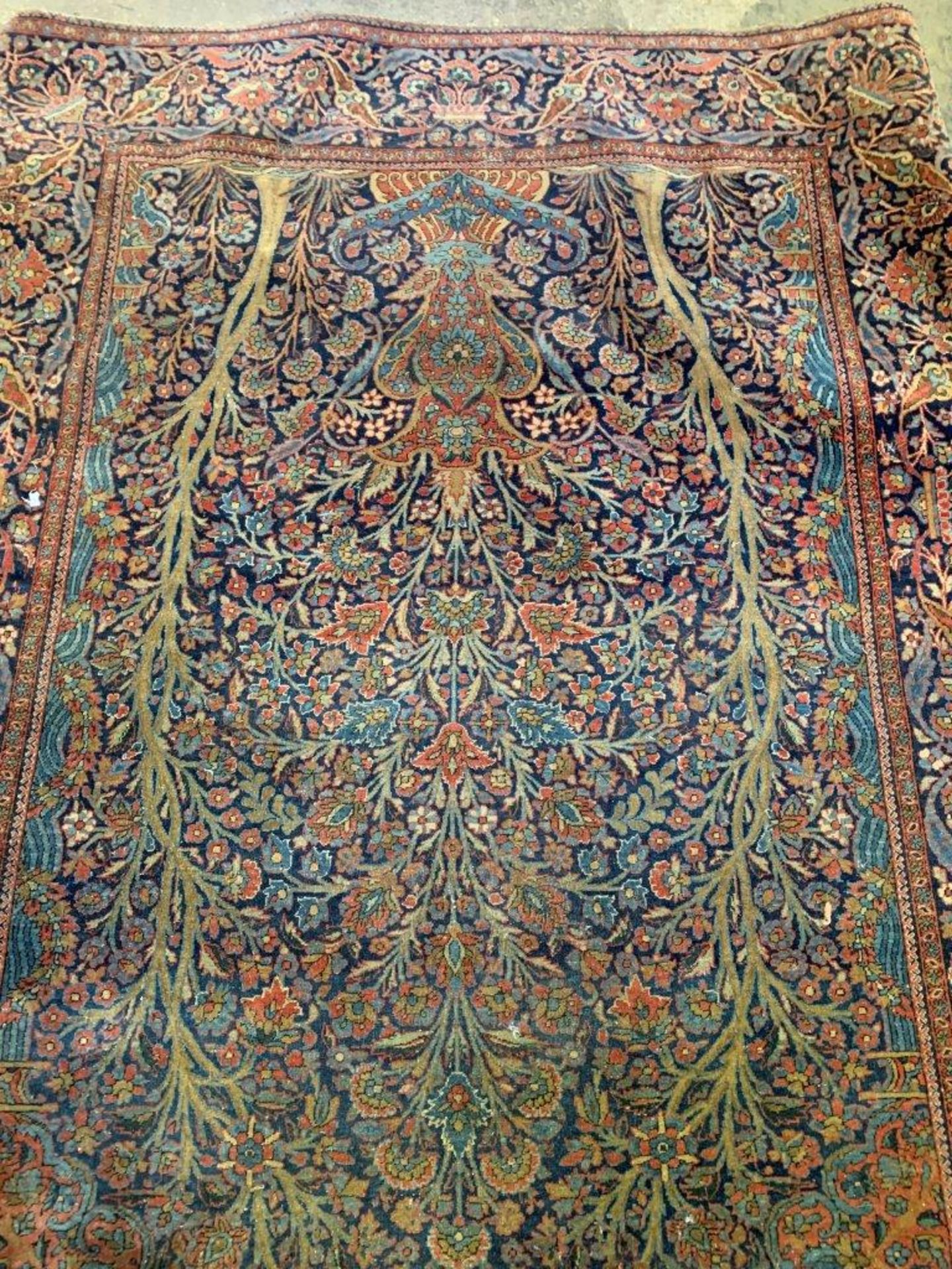 Two blue ground rugs