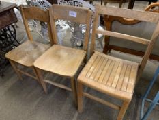 Three small wooden chairs. This item carries VAT.