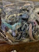 Bag containing about 40 fashion wrist watches.