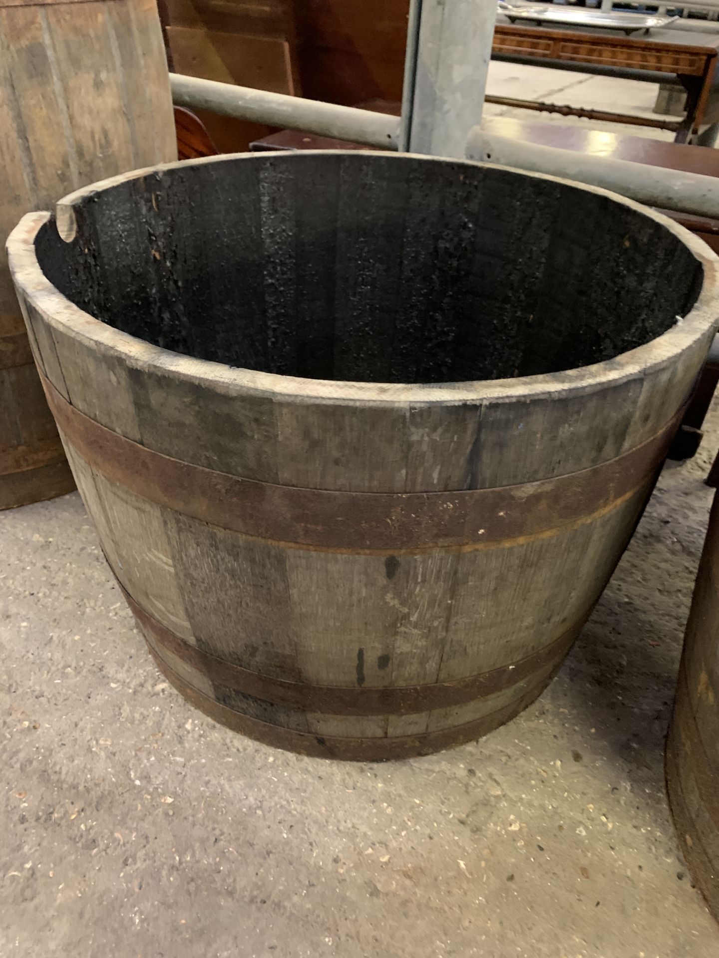 Half barrel planter. This item carries VAT.