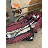 Bag containing fencing equipment and clothing.