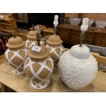 Two pairs of terracotta table lamps and large white glazed table lamp