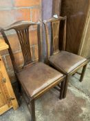 Two mid 19th century drop-in seat mahogany dining chairs with rail splat.