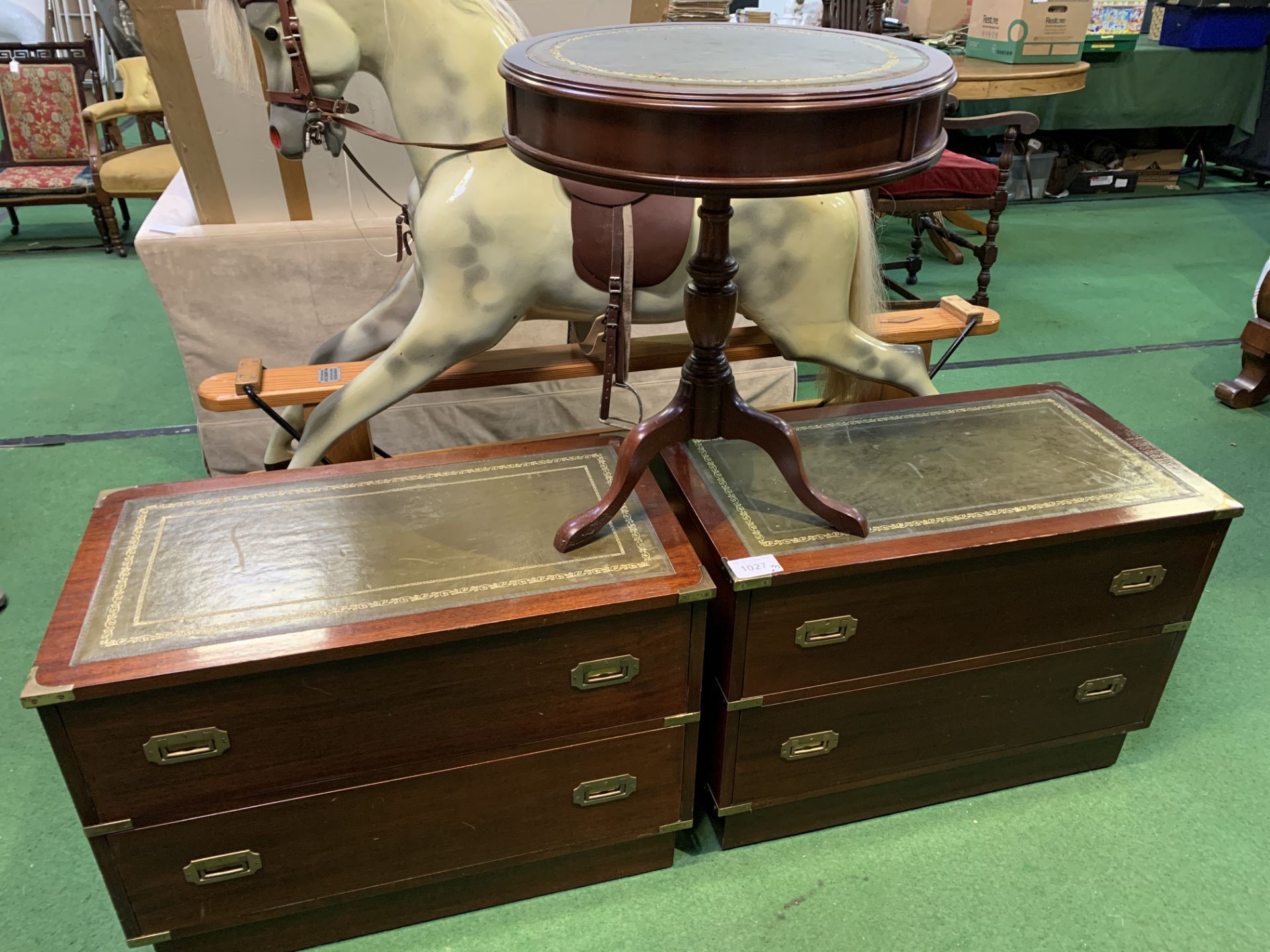 Pair of brass bound mahogany chests of two drawers; together with a mahogany drum table