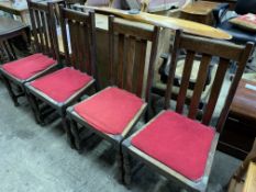 Four oak framed rail backed dining chairs