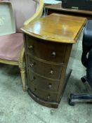 Mahogany bow-fronted small chest of four drawers