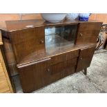 1950's sideboard with glass sliding doors.