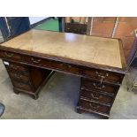 Mahogany pedestal desk with brown skiver