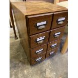 Two four drawer index card filing cabinets