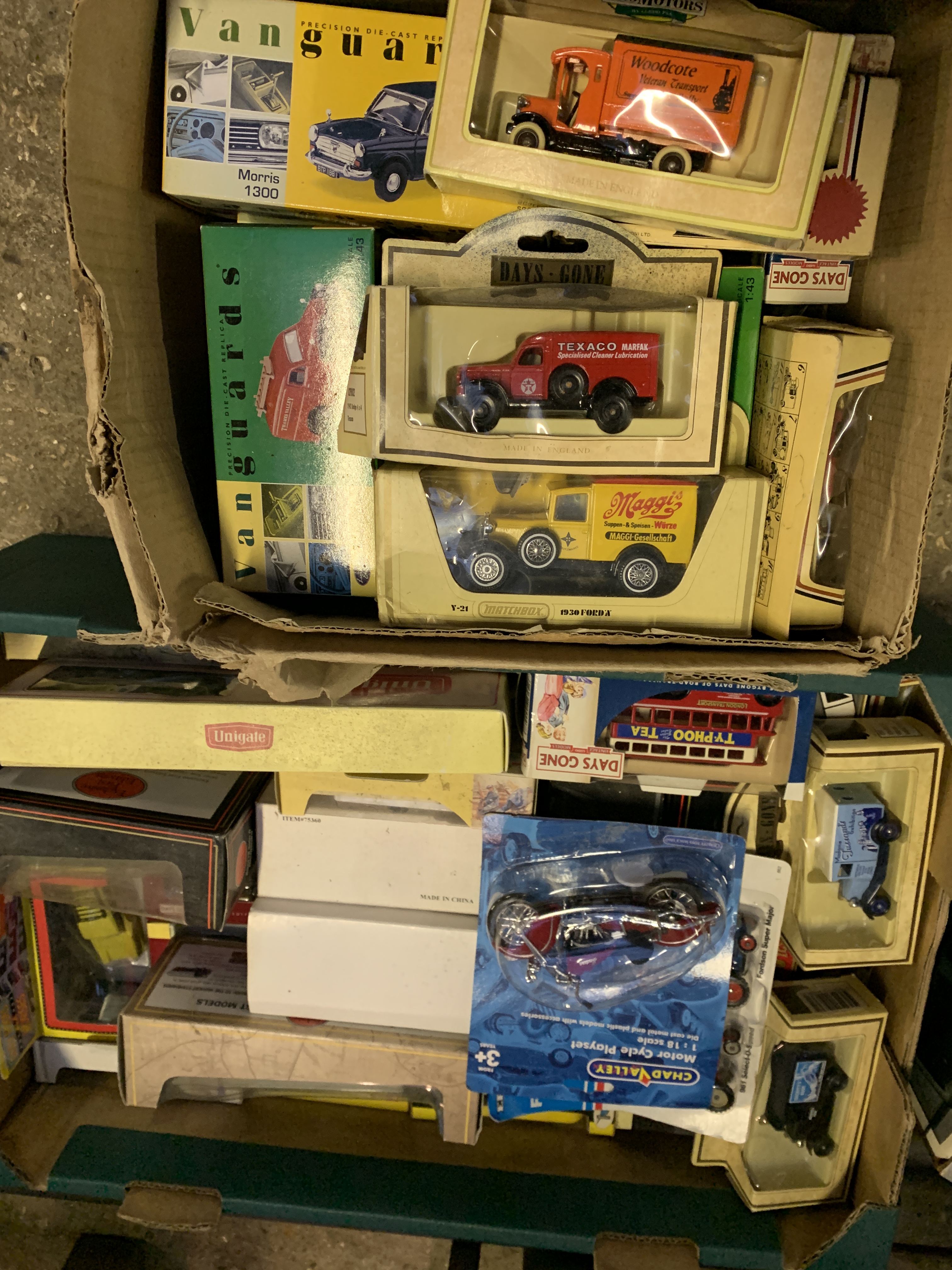 Two boxes of diecast models together with a Franklin mint Volkswagen car.