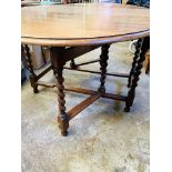 Two oak drop-side tables.