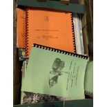 Box of engine and machinery service manuals.