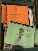 Box of engine and machinery service manuals.