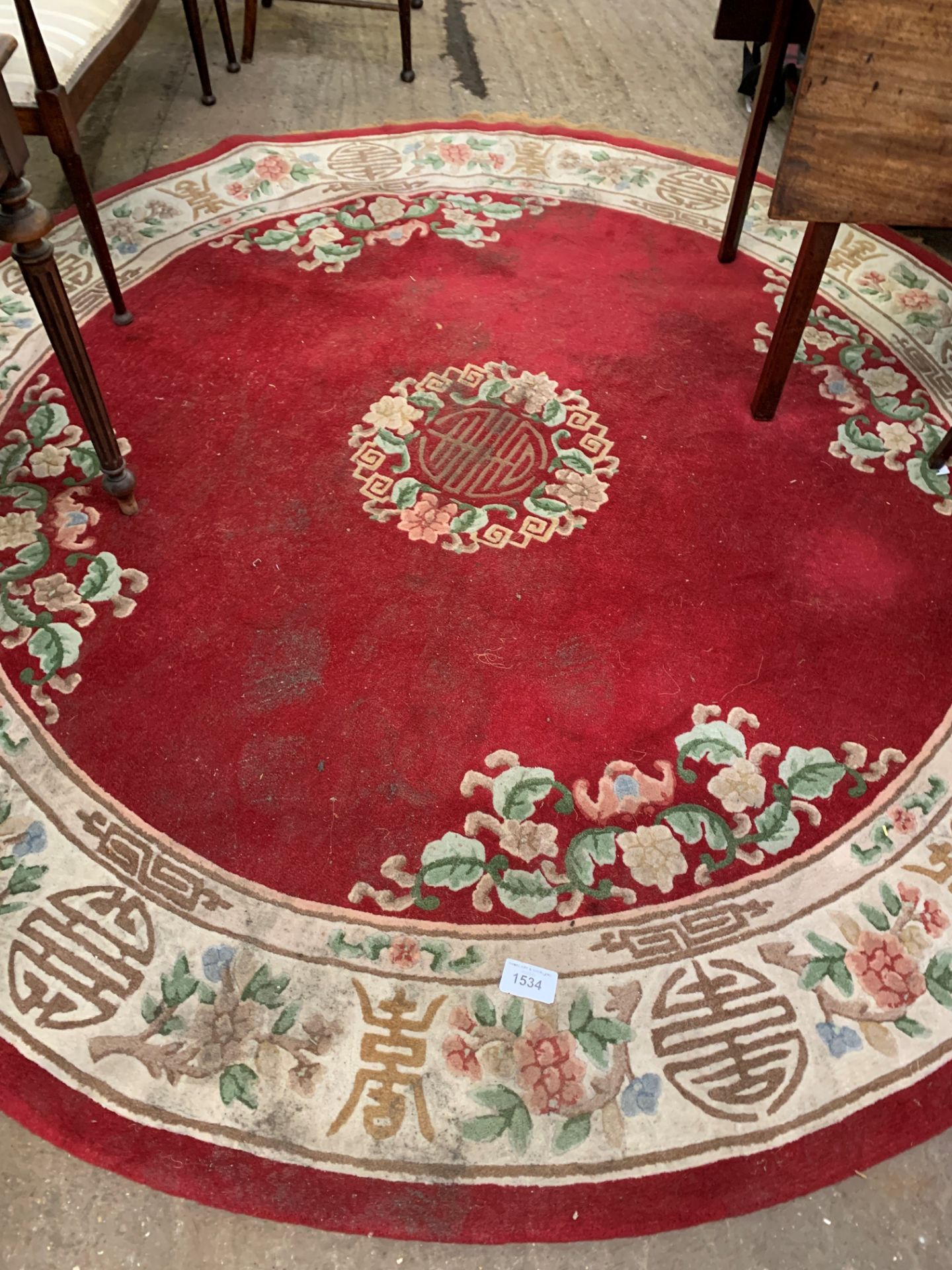 Circular red ground Chinese pattern rug.