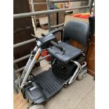 Megalite mobility chair, with key and charger.