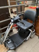 Megalite mobility chair, with key and charger.