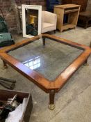 Large wood frame coffee table with glass inset top