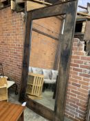 Very large wood framed wall mirror