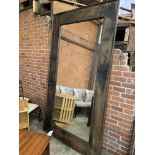 Very large wood framed wall mirror