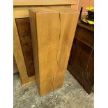 Oak cabinet with decorative inset panels to doors, and a small hardwood two door cabinet.