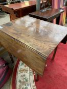Late 18th Century mahogany drop leaf table.