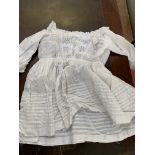 Eight cotton and lace christening gowns and dresses