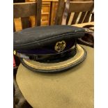 Two military Chaplain's caps and a Sam Brown belt