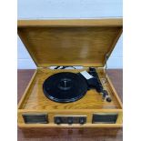 Steepletone Norwich AM/ FM radio and record player in a wooden case.