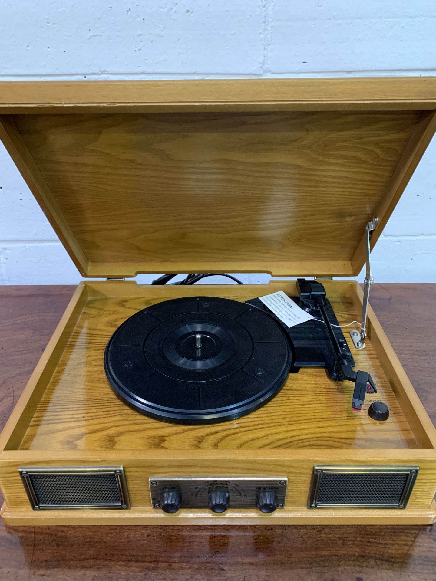 Steepletone Norwich AM/ FM radio and record player in a wooden case.