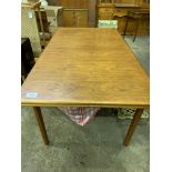 Teak extendable dining table.