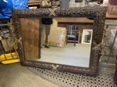 Large ornate metal framed wall mirror