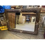 Large ornate metal framed wall mirror