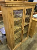 Pine shelf unit with glazed doors