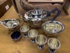 Silver plate teaset; four white metal egg cups; white metal cruet pot.